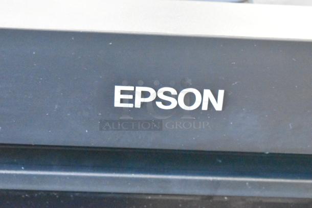 Epson WF-4830 Wireless All-in-One Inkjet Printer, black, visible Epson logo, suitable for office tasks.