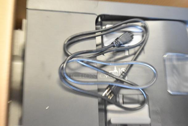 Epson WF-4830 Wireless All-in-One Inkjet Printer, new, with power cable. Features scanning, copying, faxing capability.