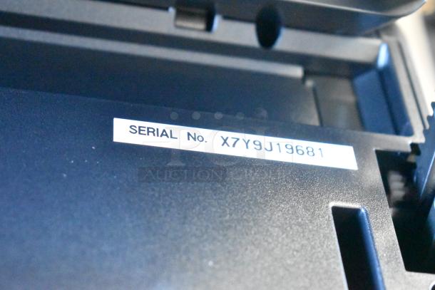 Epson WF-4830 printer showing serial number X7Y9J19681, indicating authenticity and model verification.