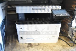 Canon F814500 countertop printer scanner copier in white. Includes touchscreen, USB port, and auction tag. Good condition.
