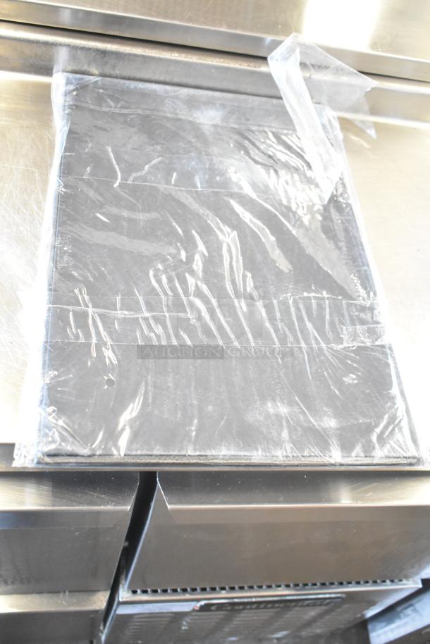 Lot of brown paper bags and Acco binders sealed in plastic, new condition.