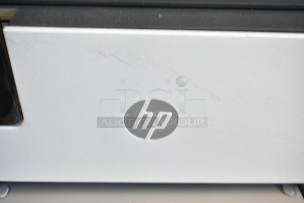 HP Countertop Printer Scanner Copier with visible HP logo. Good condition, white surface, suitable for home or office.