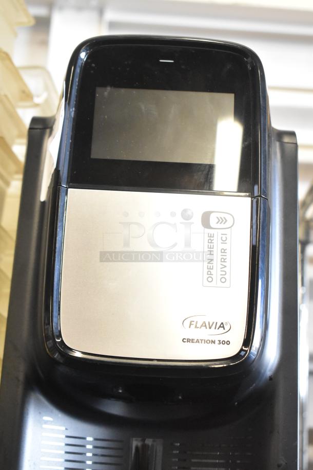 Flavia Creation 300 metal coffee brewer, commercial countertop model, single-serve, 120V, good condition.