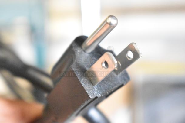 Close-up of the power plug for a Flavia Creation 300 Coffee Brewer, 120 Volts, 1 Phase.