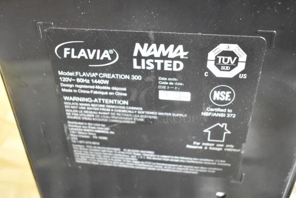 Flavia Creation 300 coffee brewer, metal, commercial countertop model. Visible label: 120V, NSF certified, NAMA listed.