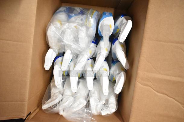 Cardboard box containing multiple bottles of Clorox spray cleaner, neatly arranged with some in plastic bags, likely new condition.
