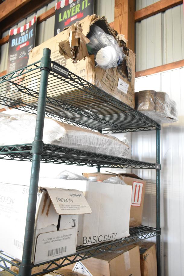 Three-tier metal shelf with various boxes, including Provon Foaming Handwash and Diversey Foaming Grease Cleaner, in fair condition.