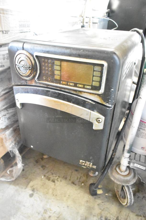 Turbochef NGO metal commercial rapid cook oven, electric powered, 208/240V, 1 phase. Used condition, with control panel and branding visible.