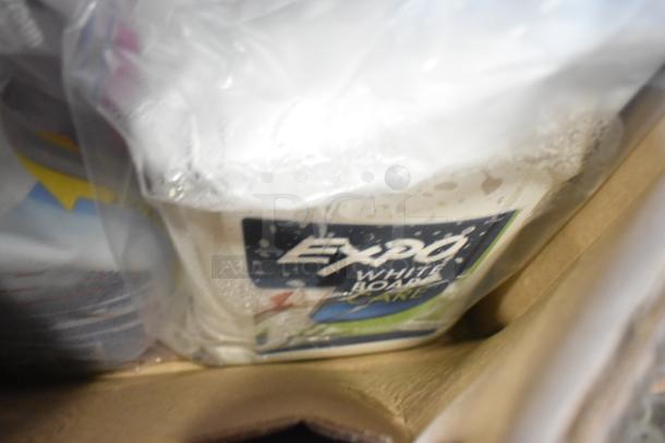 Two Tier Lot with Clorox Disinfectant Spray and Expo White Board Care, partially visible in packaging, good condition.