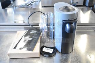 BRAND NEW SCRATCH AND DENT! DeLonghi ENV150GY Nespresso VertuoPlus Single Cup Coffee Machine. 120 Volts, 1 Phase. - Item #1226910