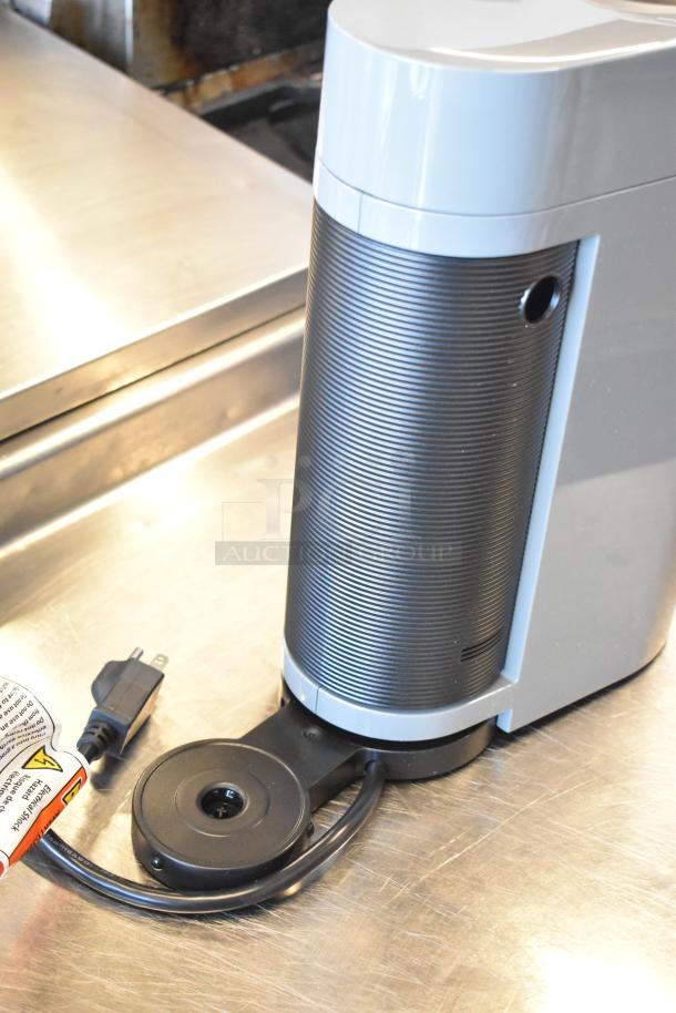 DeLonghi ENV150GY Nespresso VertuoPlus coffee machine, gray, 120V, single cup feature. Cord and base visible, excellent condition.