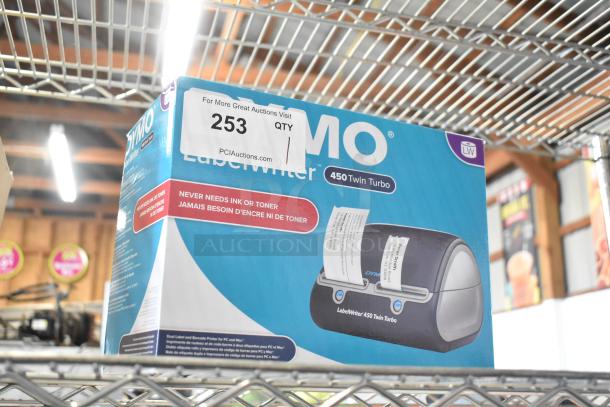 Dymo LabelWriter 450 Twin Turbo in box, new condition. Dual label printer, never needs ink or toner. Box shows product image and labels.