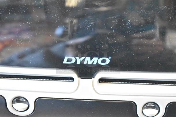 Dymo LabelWriter 450 Twin Turbo printer, black, dual label slots, visible Dymo logo, good condition.