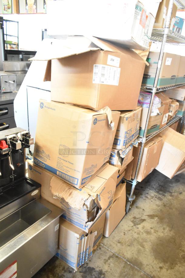 Nine assorted boxes including WIN1420B Centerpull Towels and Dixie Ultra 011100539 Towels. Some boxes show wear.