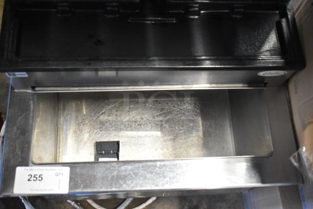 Stainless steel commercial 6 flavor beverage machine on Cornelius drop-in ice bin, 115 volts, 1 phase. Condition shows signs of use.