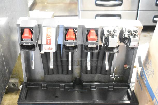 Stainless steel 6-flavor carbonated beverage machine on Cornelius drop-in ice bin, 115 volts, 1 phase, visible Diet Coke label.