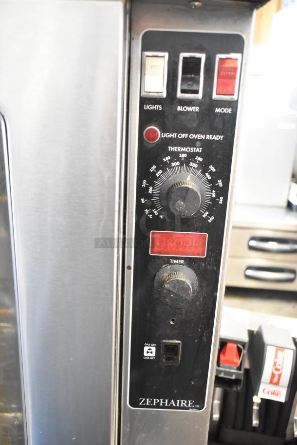 Blodgett Zephaire 200 stainless steel convection oven, thermostatic controls, visible labels, used condition.