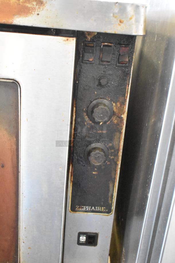 Blodgett Zephaire stainless steel convection oven with view-through doors, thermostatic controls, and visible wear.