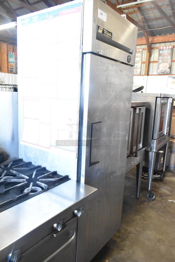 True TM-24 Stainless Steel Commercial Cooler, single door, metal rack, on casters, 115V, 1 Phase, used condition.