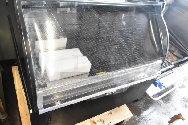 Avantco metal commercial grab-n-go merchandiser with top case; visible glass damage; ideal for retail display.