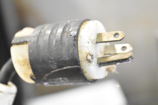 Qualite food warmer power plug, showing slight wear and corrosion. 115 volts, 1 phase.