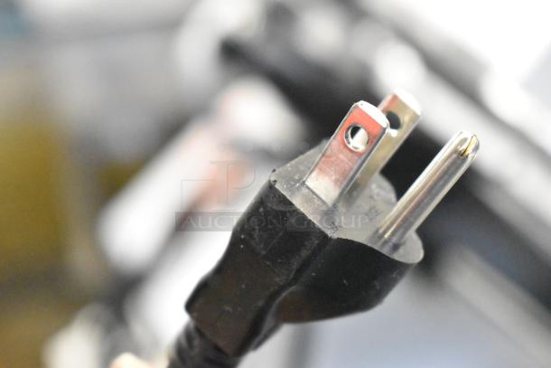 Close-up of a power plug for the Bunn 33200.0015 VPR Coffee Brewer, indicating its compatibility with 120 Volts, 1 Phase.