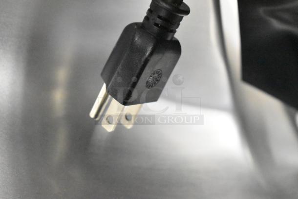 Electrical plug of the 2023 Bizerba GSP HD stainless steel meat slicer, 120V, 1 phase, on a stainless stand.