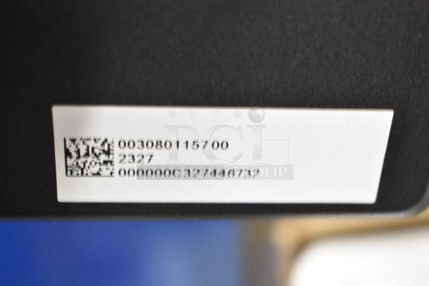 Label on Mettler Toledo FreshWay scale showing serial number 003080115700 and barcode.