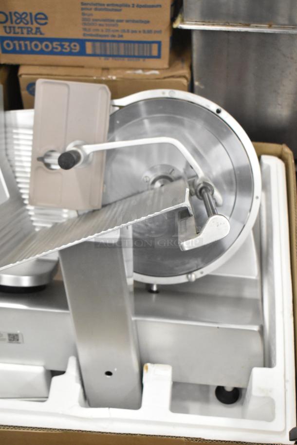 Bizerba SE 12 US stainless steel commercial meat slicer, 120V, 1 phase. Countertop design, in good condition.