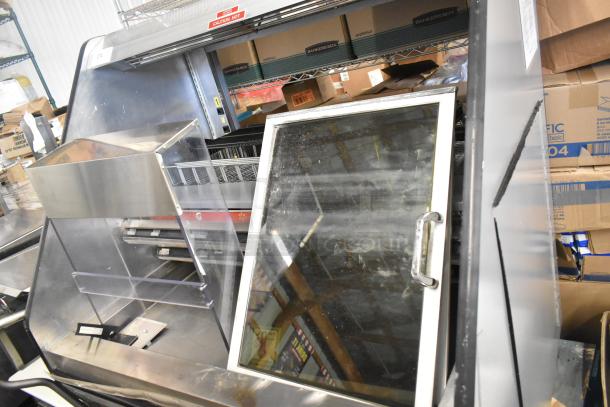 Metal Commercial Horizontal Grab N Go Merchandiser, stainless steel, used condition, sliding glass door, caution hot label.