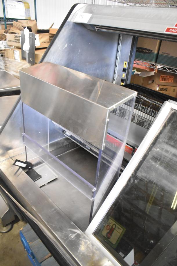 Metal Commercial Horizontal Grab N Go Merchandiser, stainless steel, clear acrylic front, industrial condition, minor wear.