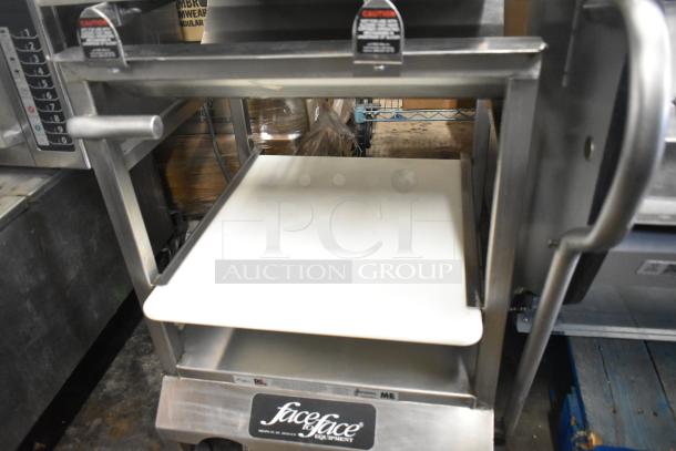 Face to Face stainless steel commercial meat slicer equipment stand with durable construction and easy-to-clean surface.