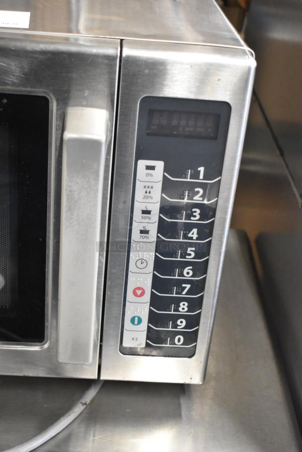 Amana RCS10TS commercial microwave, stainless steel, countertop model. Features dial panel and settings. 120V, 1 phase.