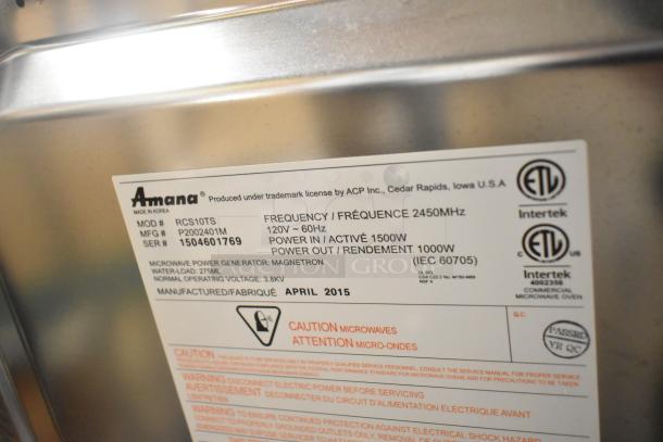 Amana RCS10TS stainless steel commercial microwave oven label, showing model, power specifications, and safety warnings.