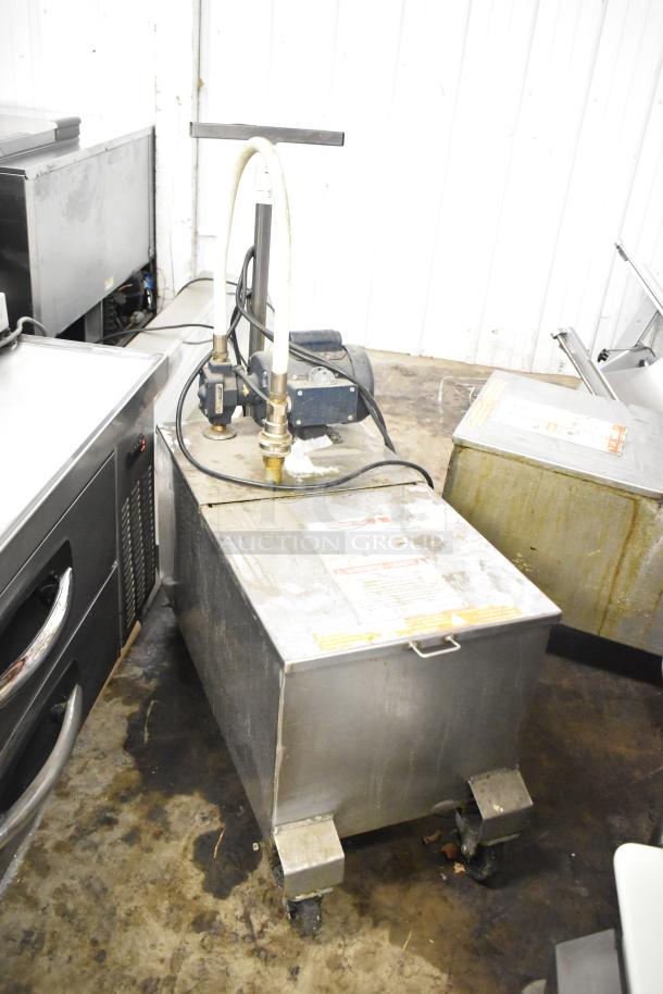 402 Metal Commercial Portable Fryer Oil Filter, 120 Volts, used condition, visible labels, on caster wheels.