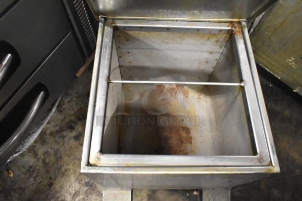 Metal Commercial Portable Fryer Oil Filter, Model 402, 120 Volts, 1 Phase, visible signs of use, stainless steel construction.