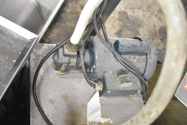 402 Metal Commercial Portable Filter for Fryer Oil, used condition. Features 120V, 1 Phase, wiring and connectors visible.