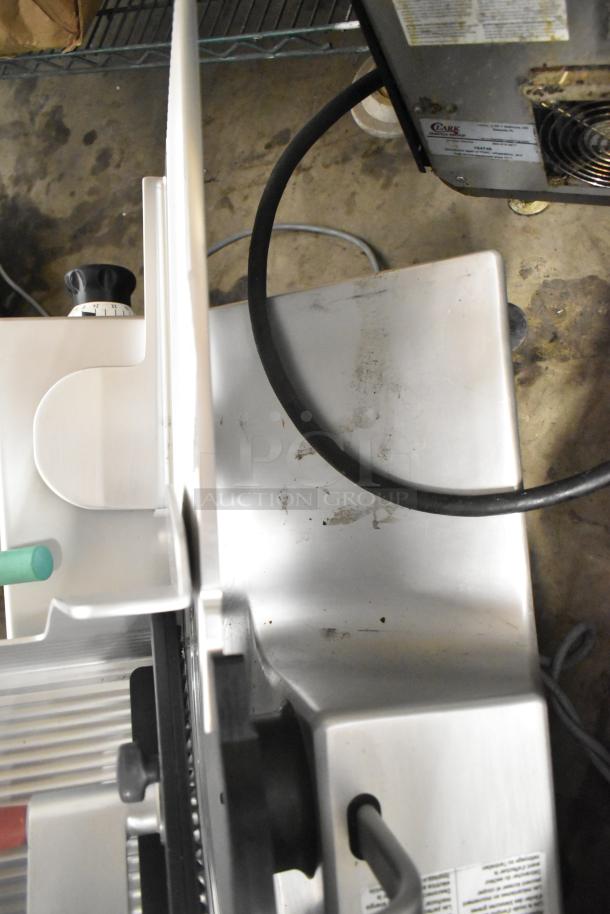 2016 Bizerba GSP H stainless steel commercial countertop meat slicer, 120V, 1 Phase, showing operational controls and safety features.