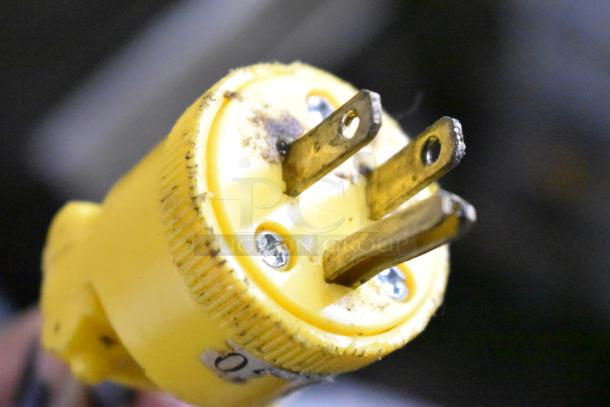 Electric plug with three prongs, slightly worn, part of the 2016 Bizerba GSP H Meat Slicer. 120 volts, single-phase.