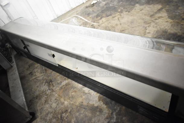 Turbo Air stainless steel commercial sushi display case, countertop model. Visible wear. 120V, 1 phase.