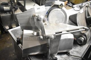 7510 Stainless Steel Commercial Countertop Meat Slicer w/ Blade Sharpener. 120 Volts, 1 Phase. - Item #1226940