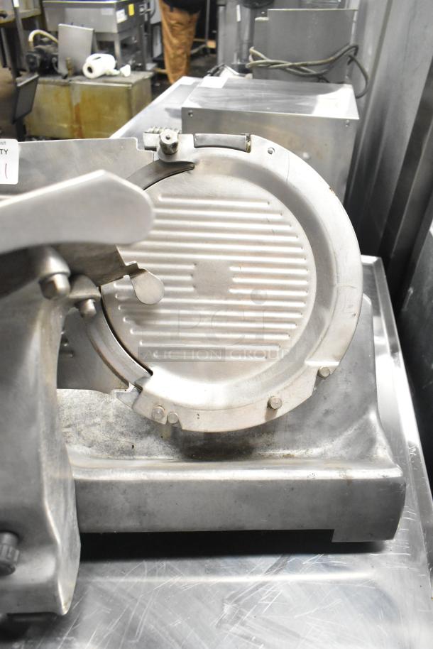 Hobart stainless steel commercial countertop meat slicer in good condition, 120 volts, 1 phase.