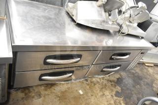 Stainless steel commercial 4-drawer chef base with AdvantEDGE label, on casters. Operating at 115 volts, 1 phase.