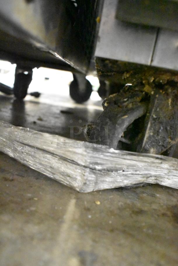 Stainless Steel Commercial 4 Drawer Chef Base on casters, 115V, 1 Phase. Features robust construction and mobility.