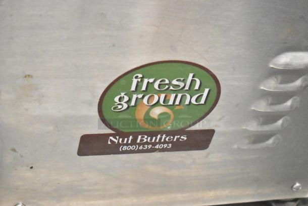 Olde Tyme stainless steel nut grinder base with "fresh ground Nut Butters" label. 115 volts, 1 phase.
