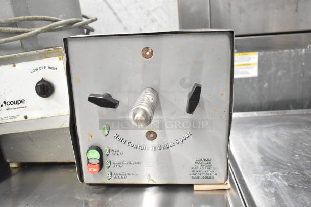 Olde Tyme stainless steel nut grinder base, 115V, 1 phase, used condition. Front controls include start/stop buttons and safety cautions.