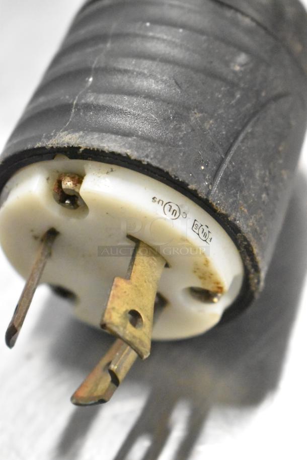 Bakers Pride DPOC-S pizza oven plug with visible UL certification marks, showing signs of wear.