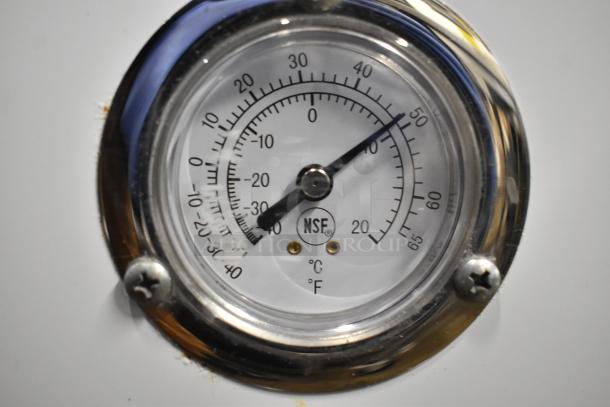 Thermometer dial on Beverage Air SM34N-W Milk Cooler showing temperature in Celsius and Fahrenheit, NSF certified.