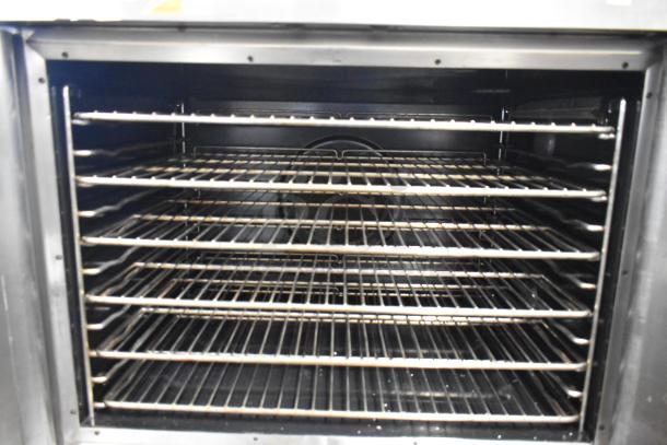 2 Vulcan ECO4C stainless steel electric convection ovens with view-through doors, metal racks, 480V, 3-phase.