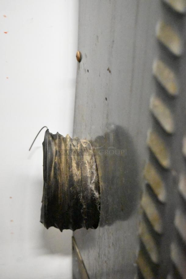 Stainless steel panel with metal vent and rust signs. Part of Vulcan ECO4C convection oven. 480V, 3 phase.